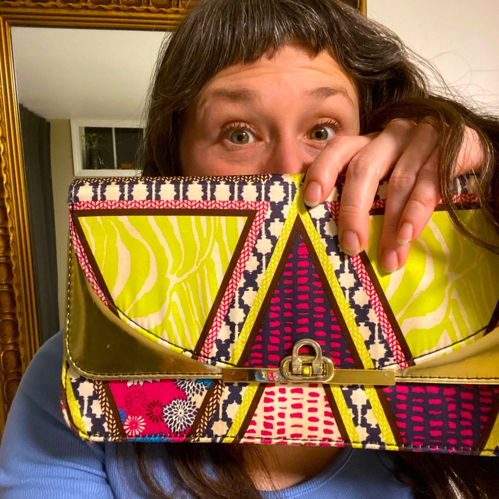 Hip, kitschy patterned clutch, with gold accents
